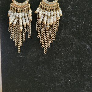 White and gold earings